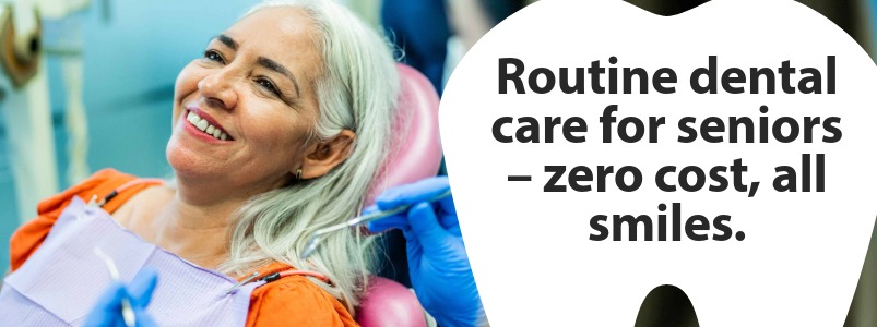 A happy senior reclining in a chair as her dentist prepares to check her teeth.